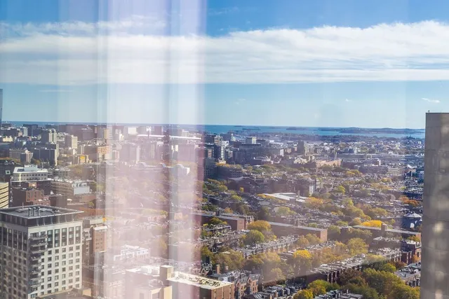 a table with chairs and wooden floor