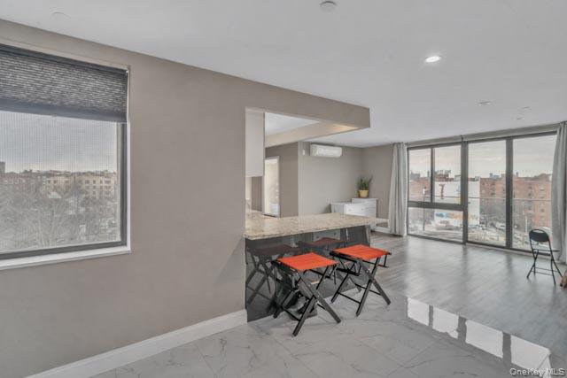 45-16 83rd Street, Unit E8F Queens, NY 11373 - Photo 3 of 19 a living room with furniture and a large window