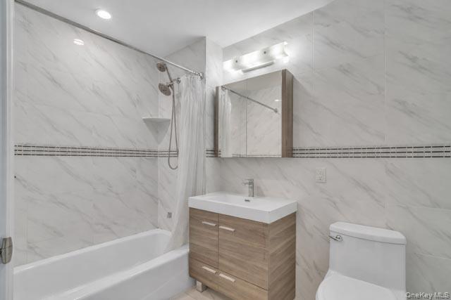 45-16 83rd Street, Unit E8F Queens, NY 11373 - Photo 10 of 19 a bathroom with a sink toilet and shower