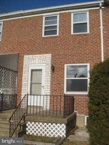 59 Hawthorne Road Middle River, MD 21220 - Photo 1 of 18 a front view of a house with a door