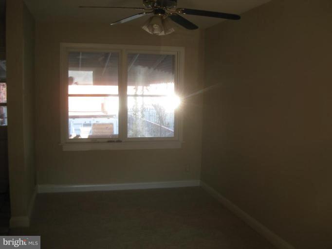 59 Hawthorne Road Middle River, MD 21220 - Photo 3 of 18 an empty room with a window