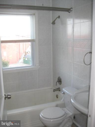 59 Hawthorne Road Middle River, MD 21220 - Photo 10 of 18 a bathroom with a toilet and a shower