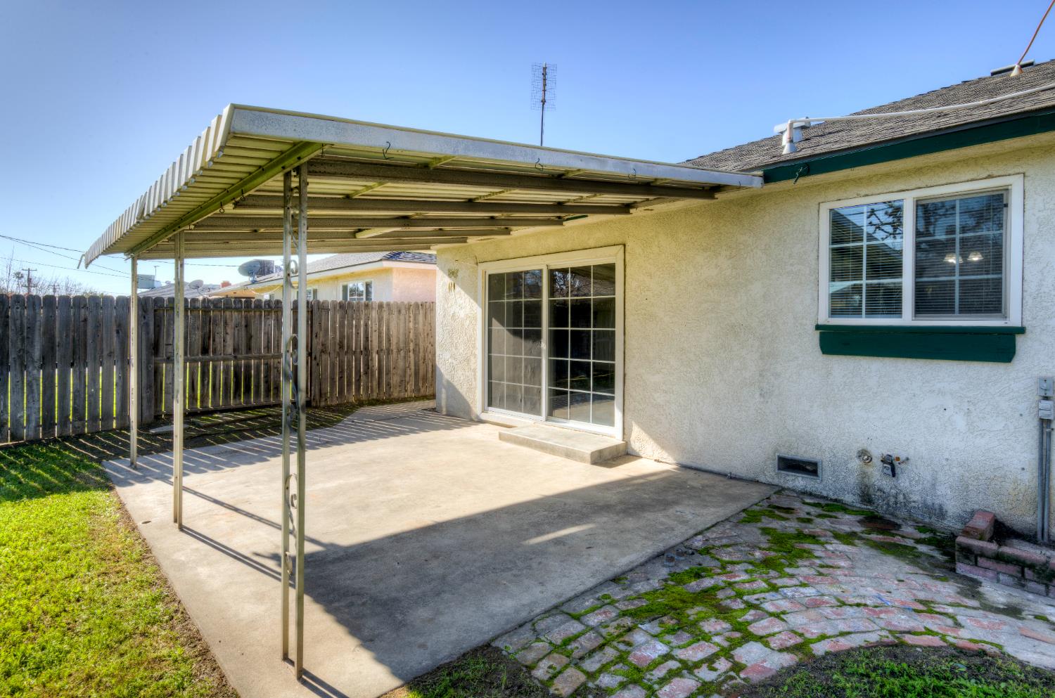 4722 North Callisch Street Fresno, CA 93726 - Photo 29 of 37 a view of a house with backyard and porch