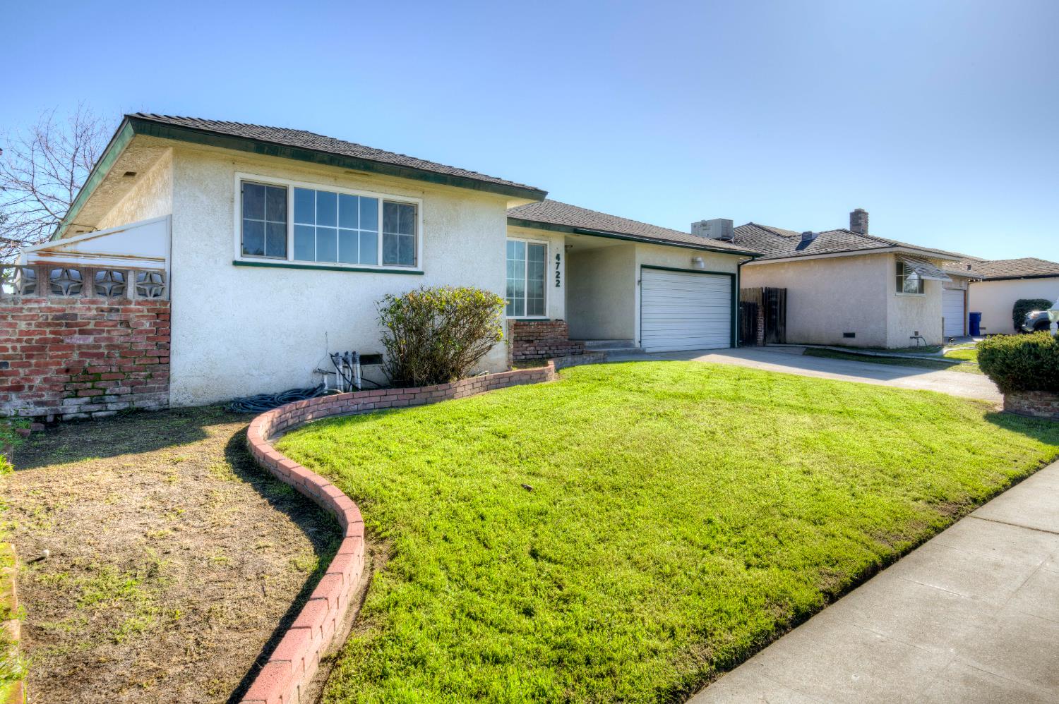 4722 North Callisch Street Fresno, CA 93726 - Photo 35 of 37 a view of a house with pool and a yard