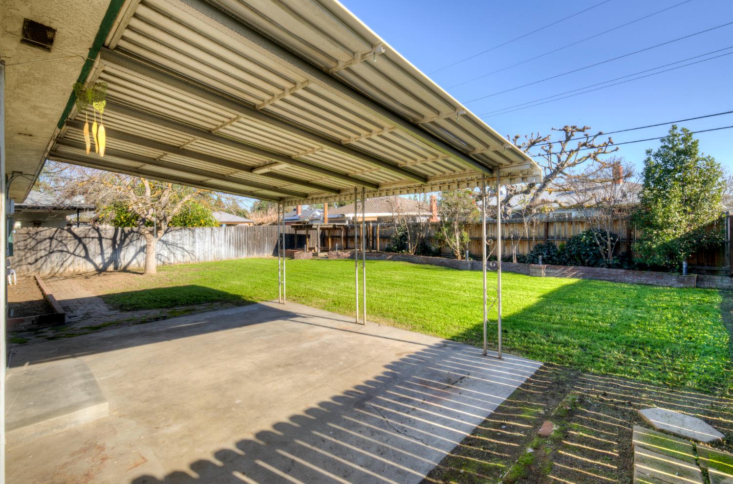 4722 North Callisch Street Fresno, CA 93726 - Photo 37 of 37 a view of a house with a yard