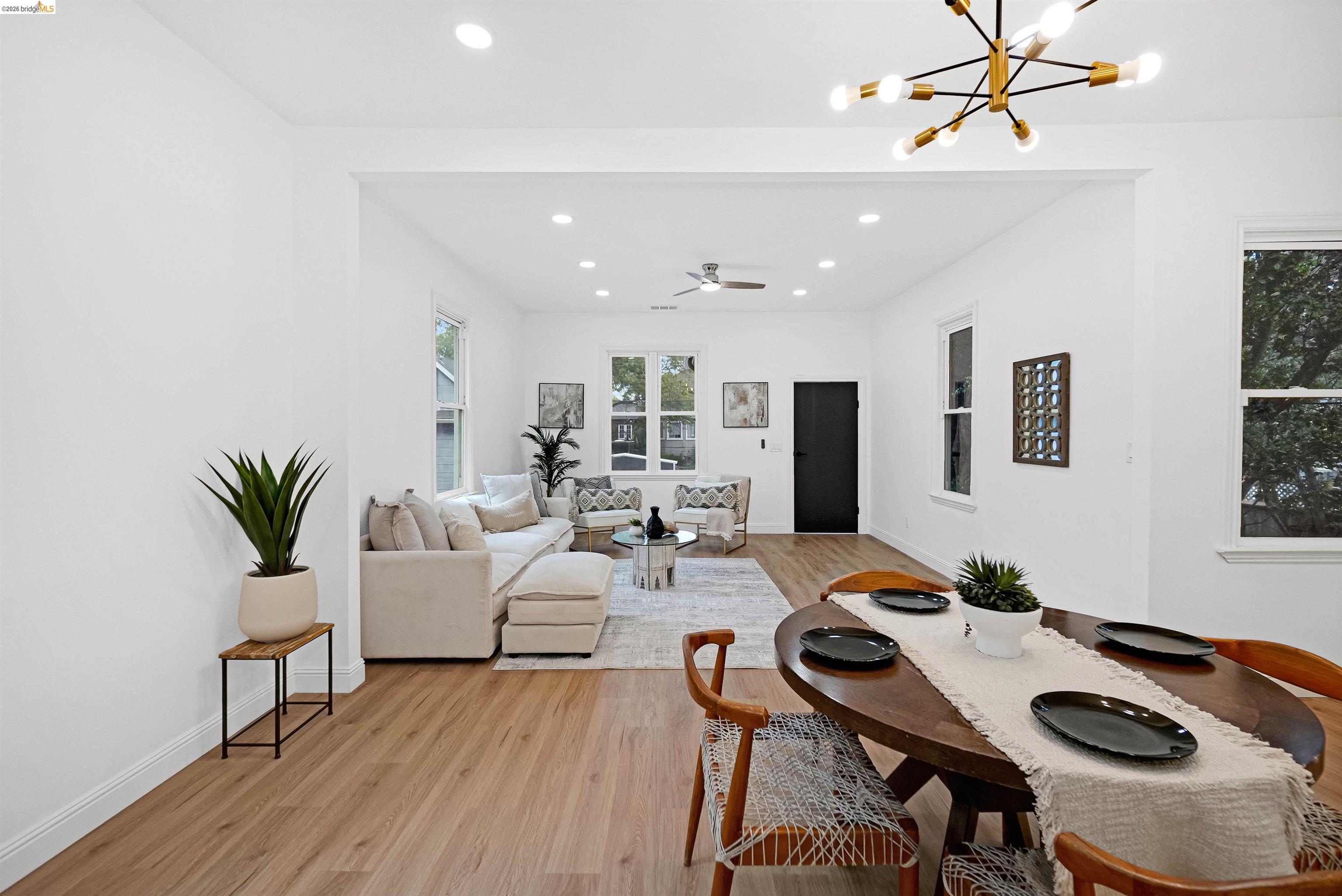 1812 Woolsey Street Berkeley, CA 94703 - Photo 9 of 48 Spacious open-concept living area featuring wood-finish flooring, recessed lighting, and a modern ceiling fan
