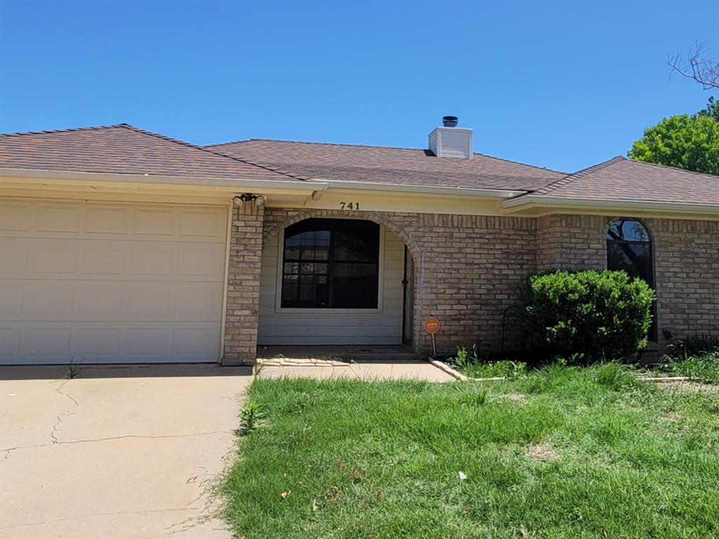 741 Tabard Trail Abilene, TX 79602 - Photo 1 of 1 a front view of a house with a yard