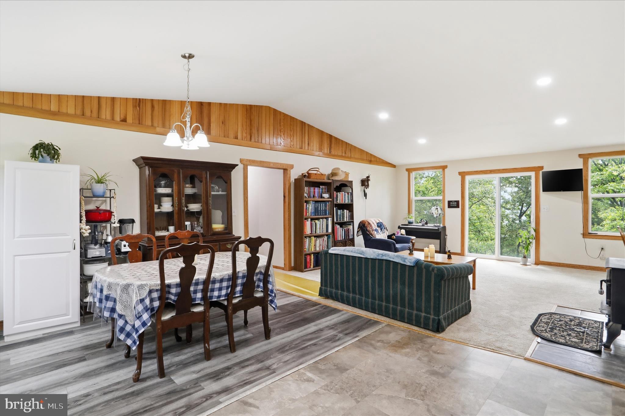 936 Johnny Cake Road Great Cacapon, WV 25422 - Photo 6 of 33 a view of a dining room with furniture window and outside view