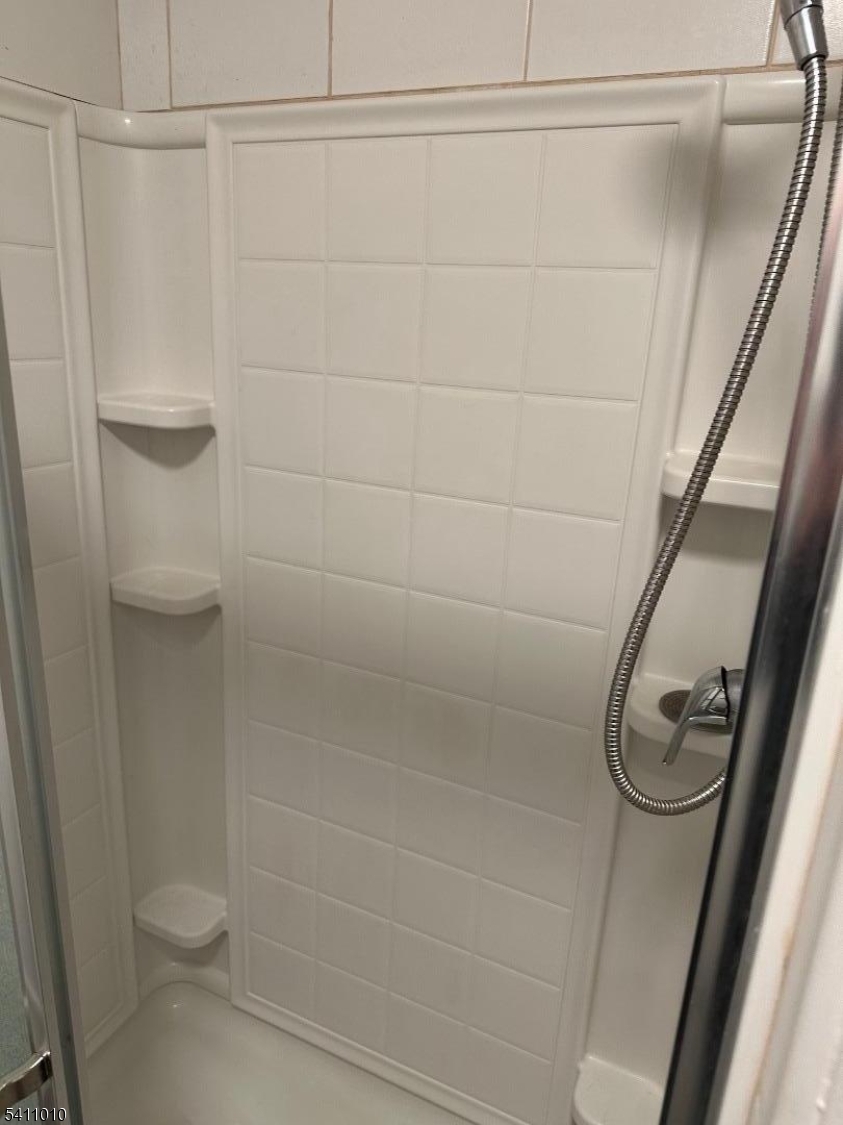 471 Pompton Avenue, Unit 3 Cedar Grove, NJ 07009 - Photo 4 of 7 a bathroom with a shower