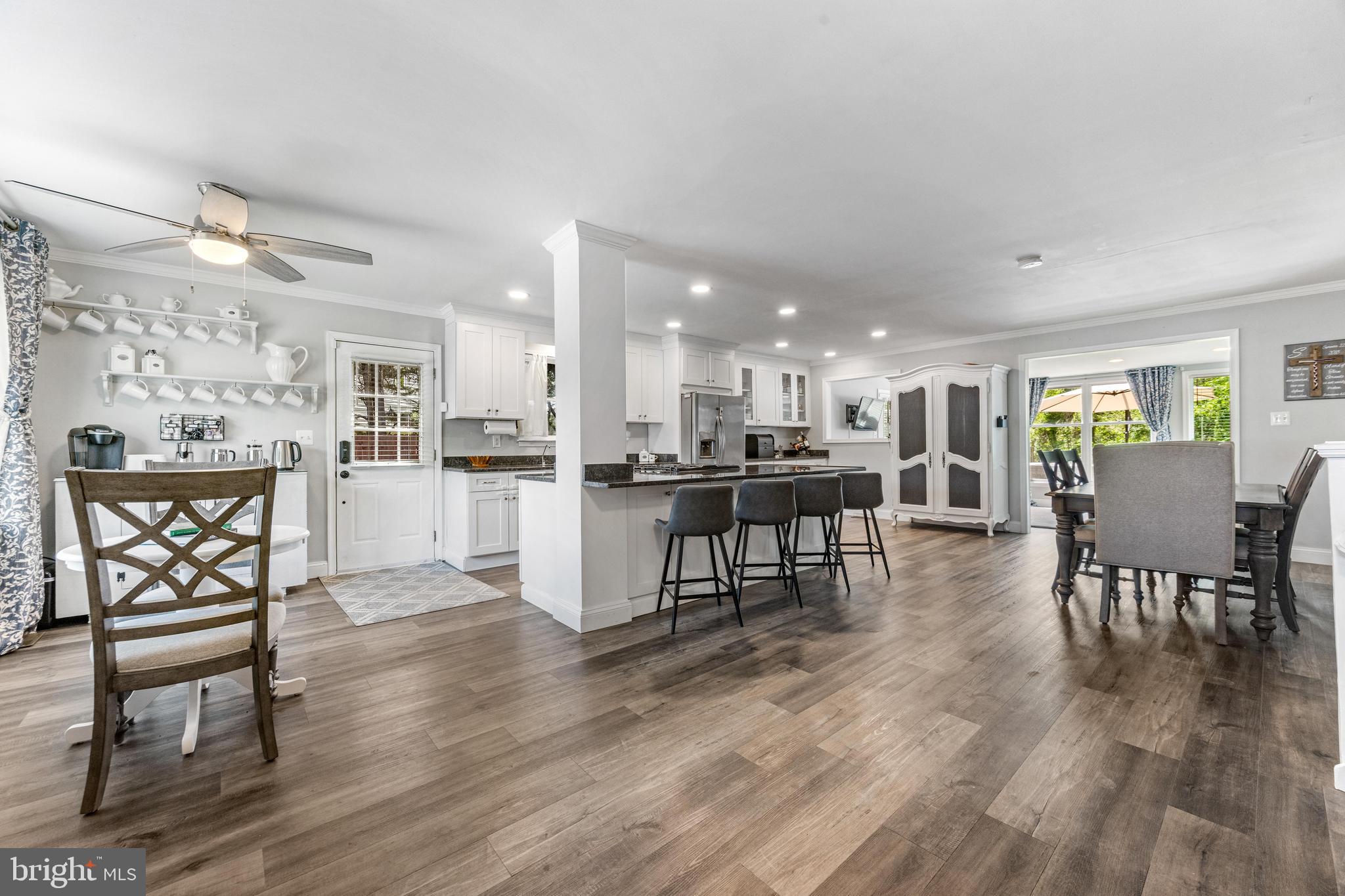 3006 Bass Place Riva, MD 21140 - Photo 14 of 51 a view of a dining room with furniture and wooden floor