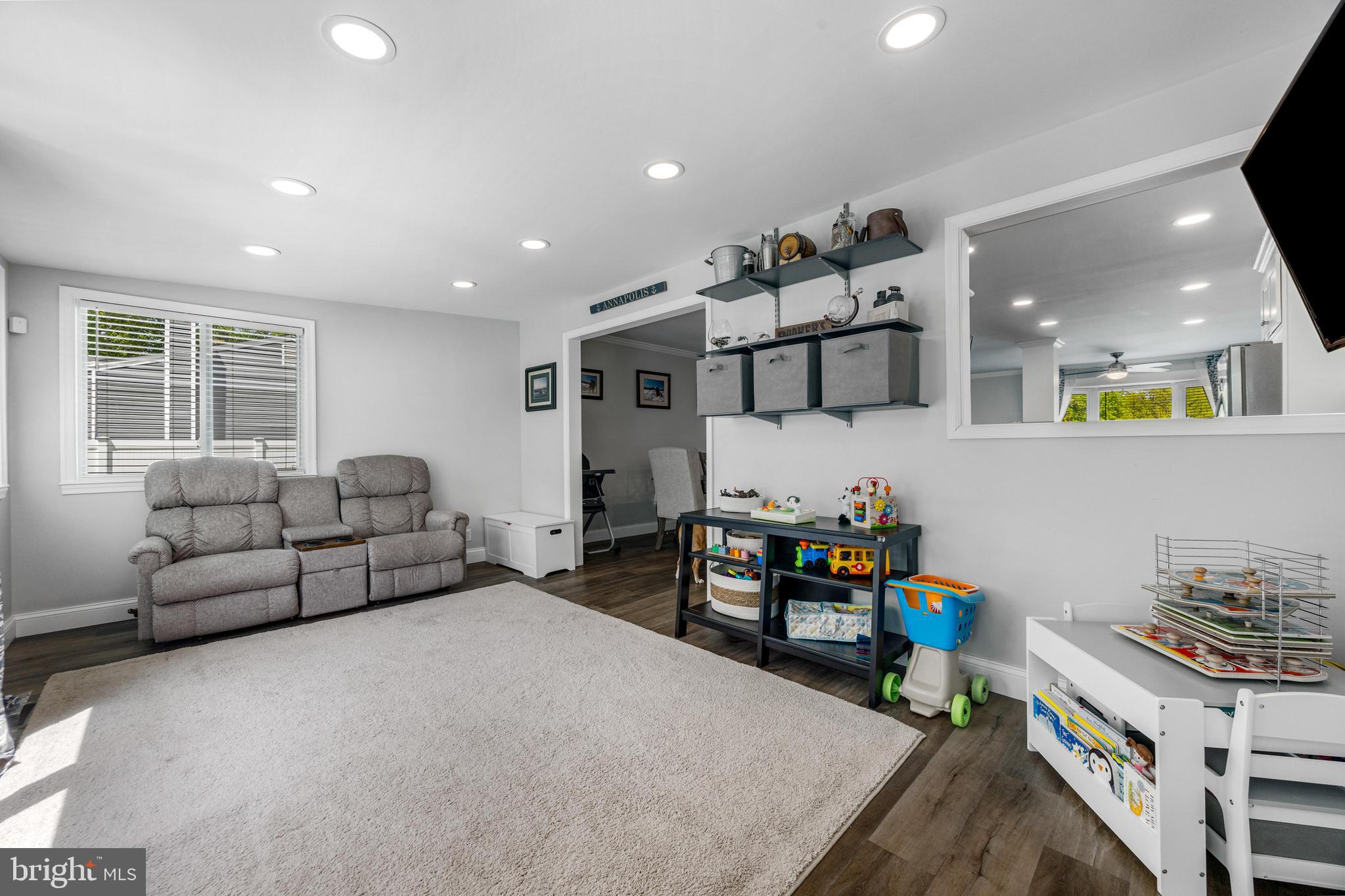 3006 Bass Place Riva, MD 21140 - Photo 21 of 51 a living room with furniture and a flat screen tv