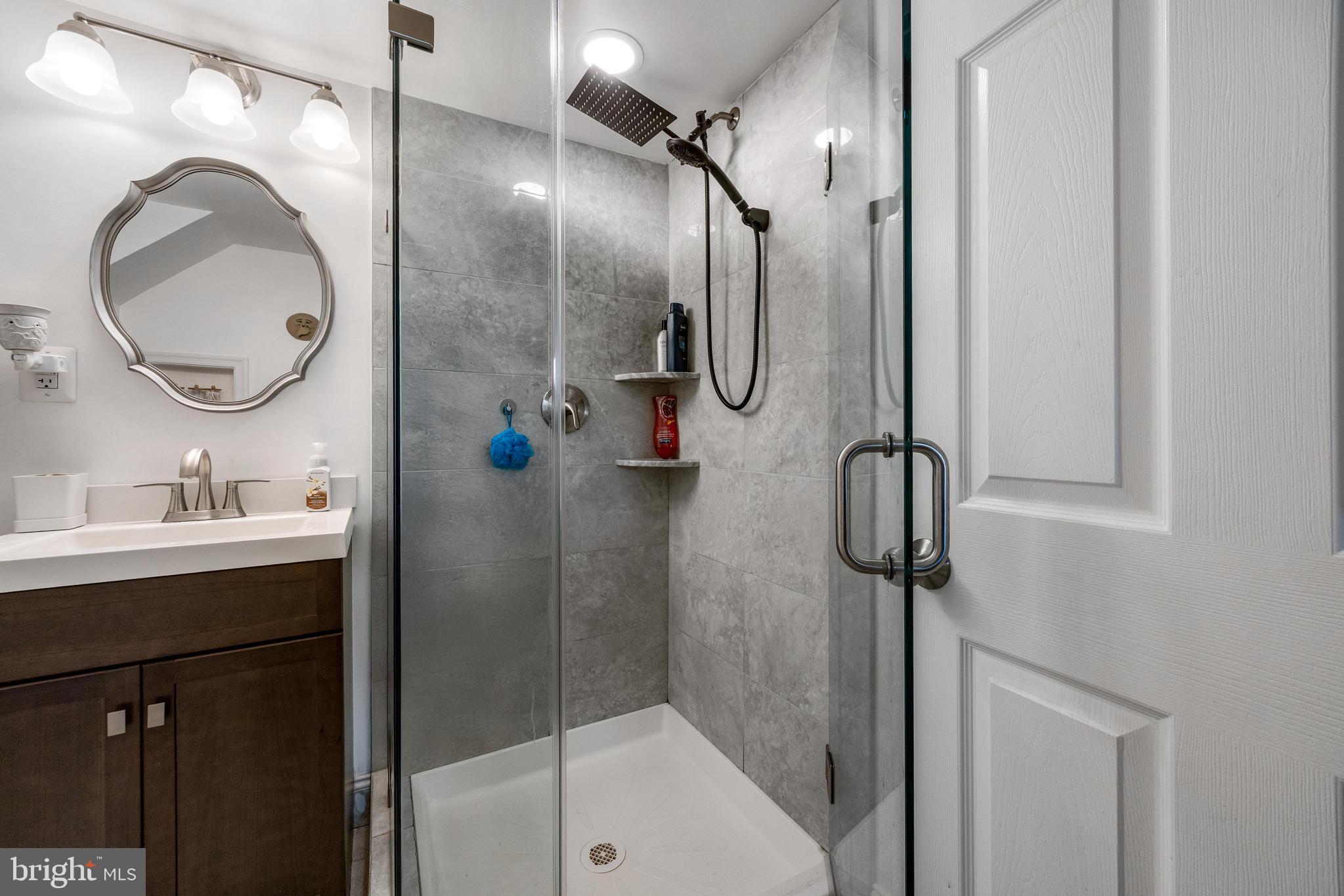 3006 Bass Place Riva, MD 21140 - Photo 28 of 51 a bathroom with a sink a toilet and shower