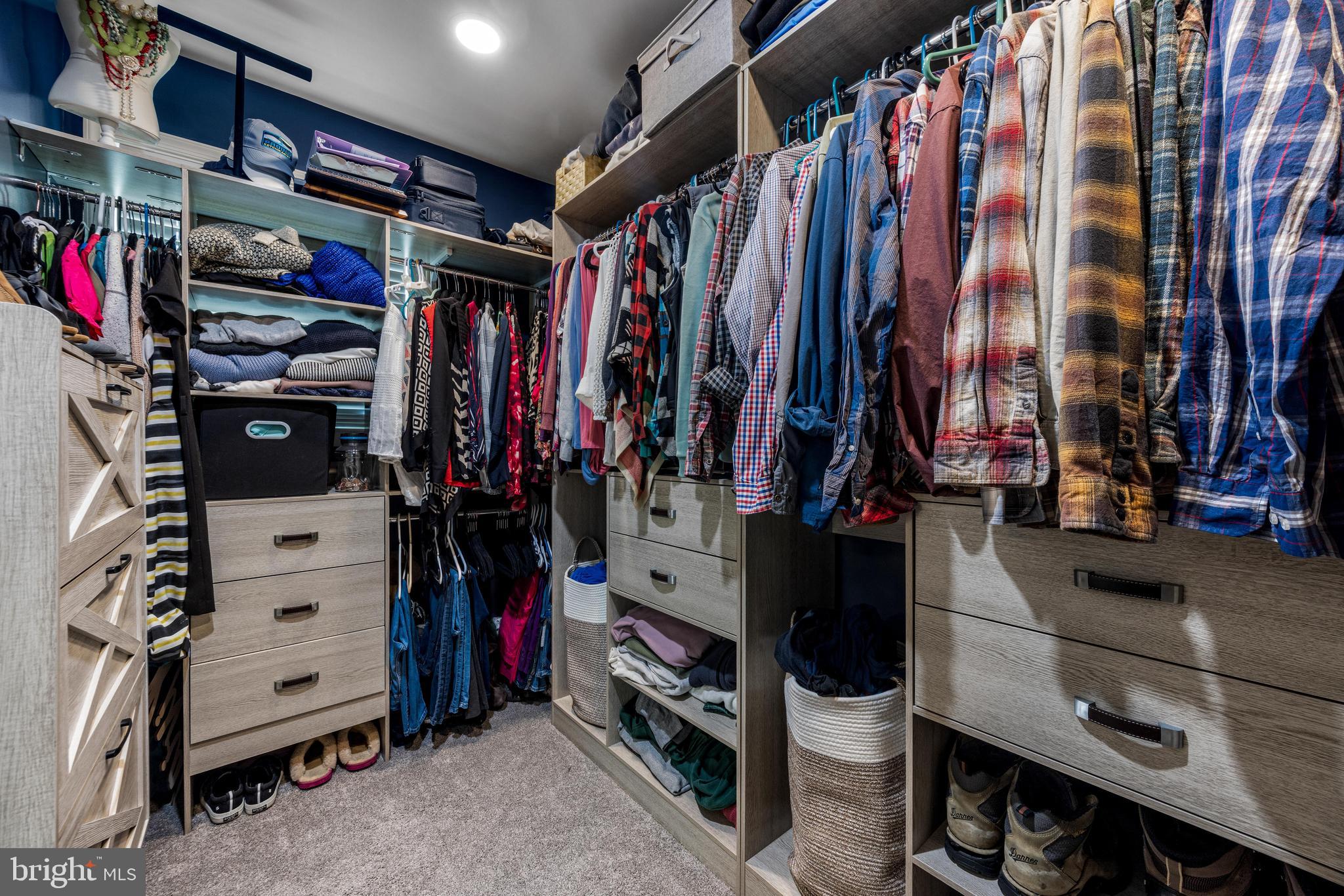 3006 Bass Place Riva, MD 21140 - Photo 33 of 51 a view of walk in closet with clothes and shoes