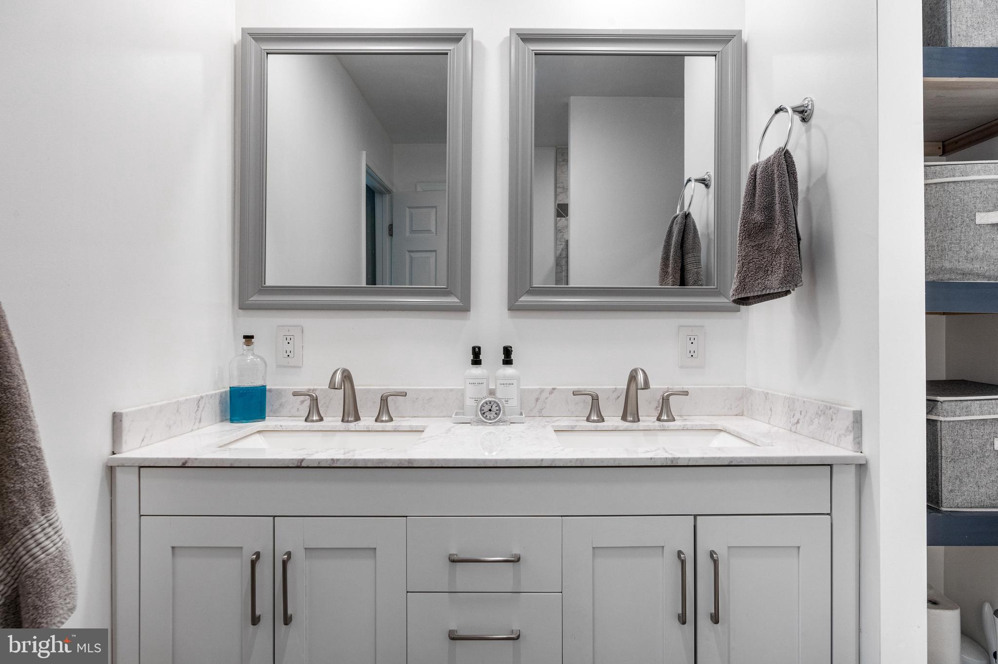 3006 Bass Place Riva, MD 21140 - Photo 36 of 51 a bathroom with a sink and a mirror