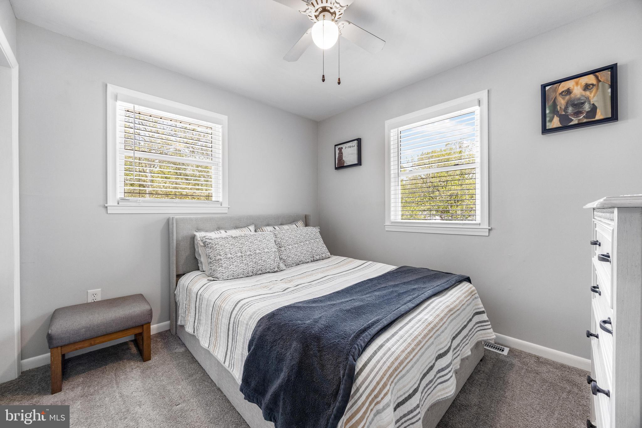 3006 Bass Place Riva, MD 21140 - Photo 39 of 51 a bedroom with a bed and a chandelier