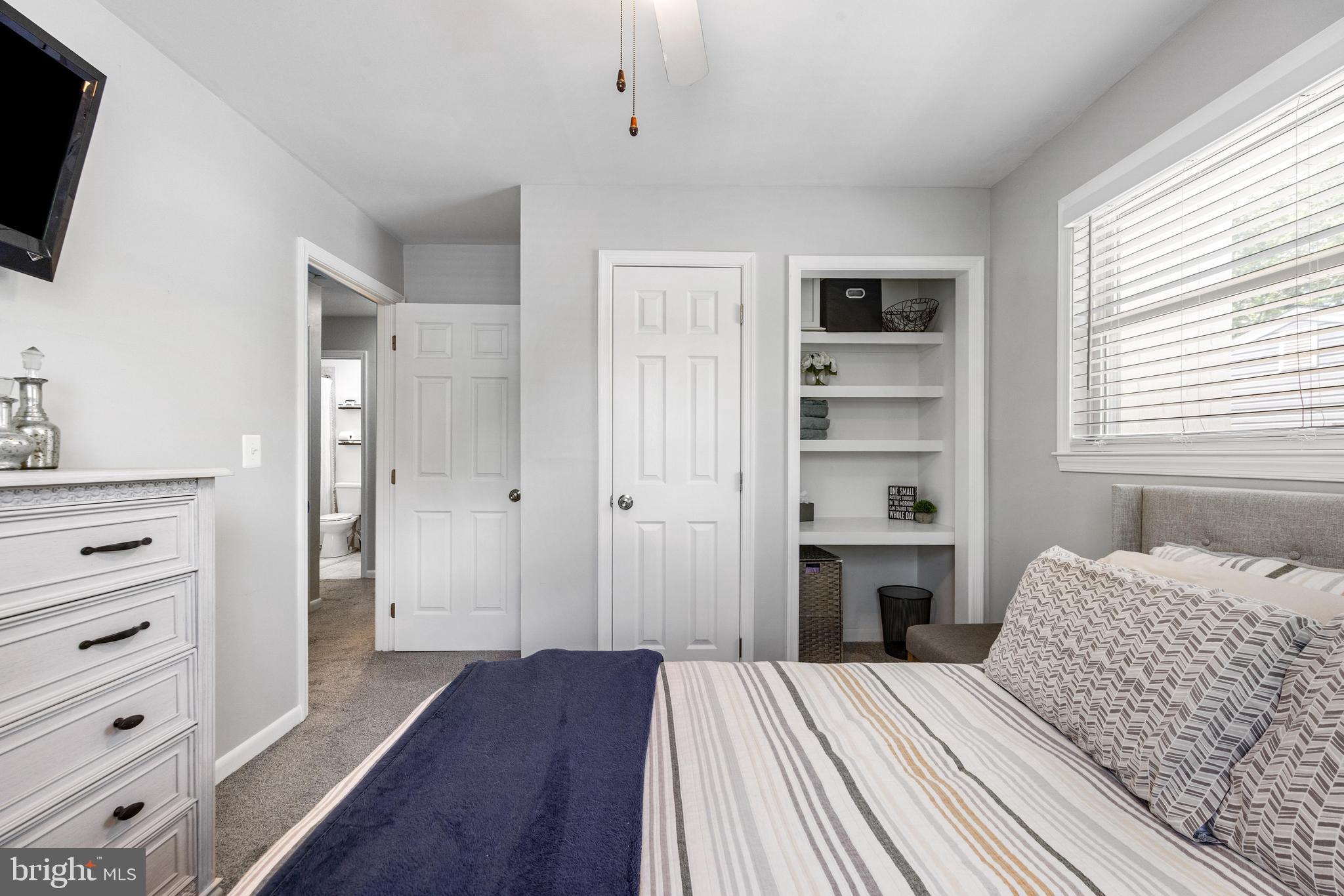 3006 Bass Place Riva, MD 21140 - Photo 40 of 51 a bedroom with a bed and a flat screen tv