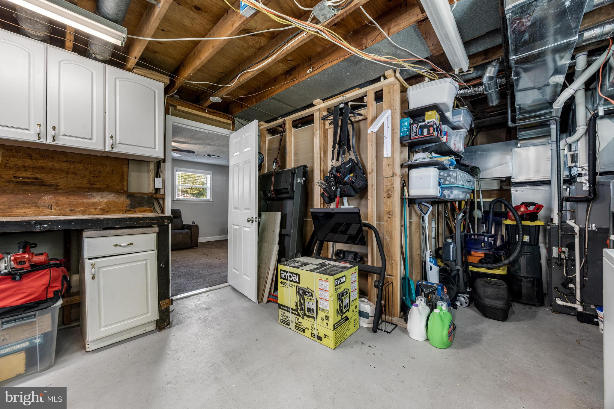 3006 Bass Place Riva, MD 21140 - Photo 43 of 51 a view of a storage with an empty shelves