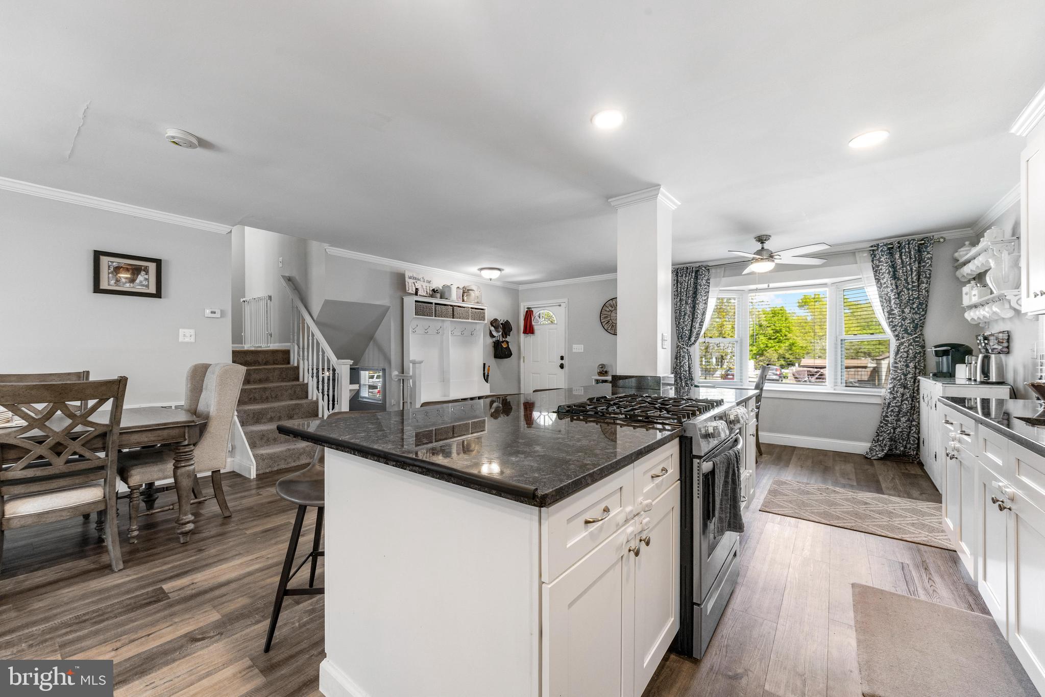 3006 Bass Place Riva, MD 21140 - Photo 5 of 51 a kitchen with a counter space a sink stove and cabinets
