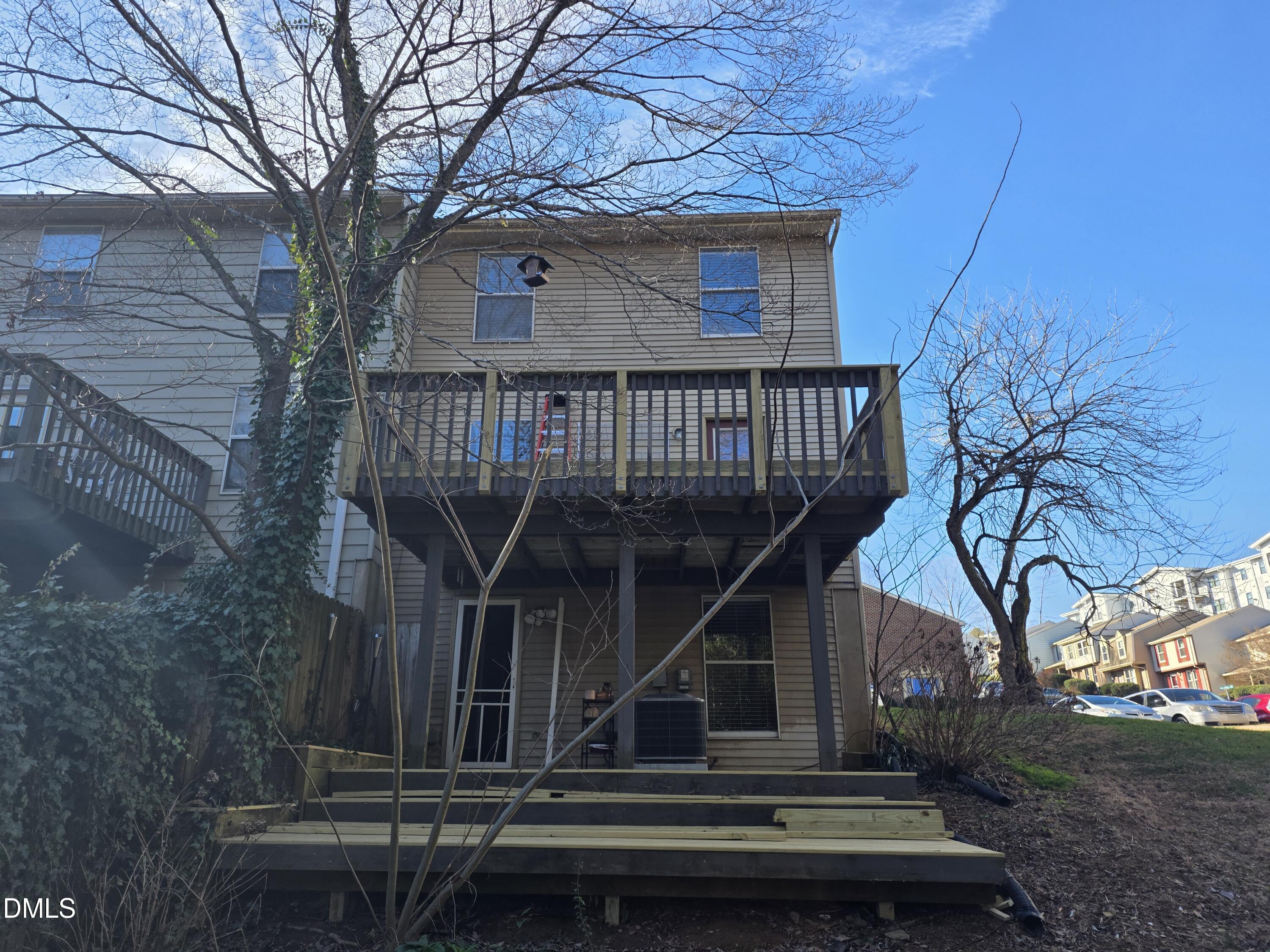 1717 Kayla Court Raleigh, NC 27606 - Photo 5 of 27 a view of backyard with small cabin