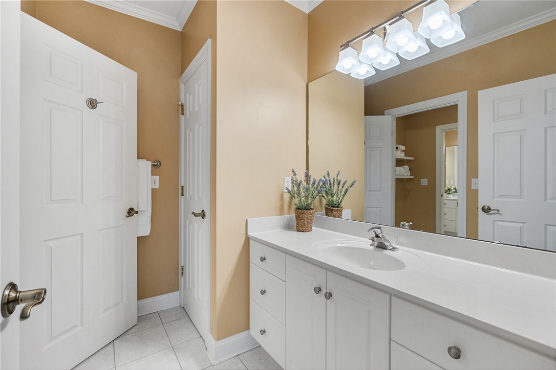 200 Graylyn Drive Anderson, SC 29621 - Photo 24 of 48 Clean lines define this bright bathroom featuring a vanity with a crisp white countertop and ample storage.