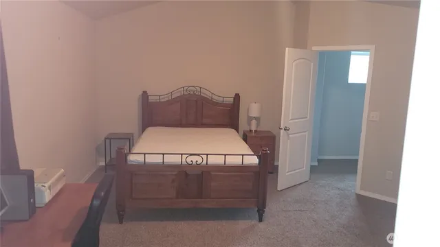 a view of a hallway to a room