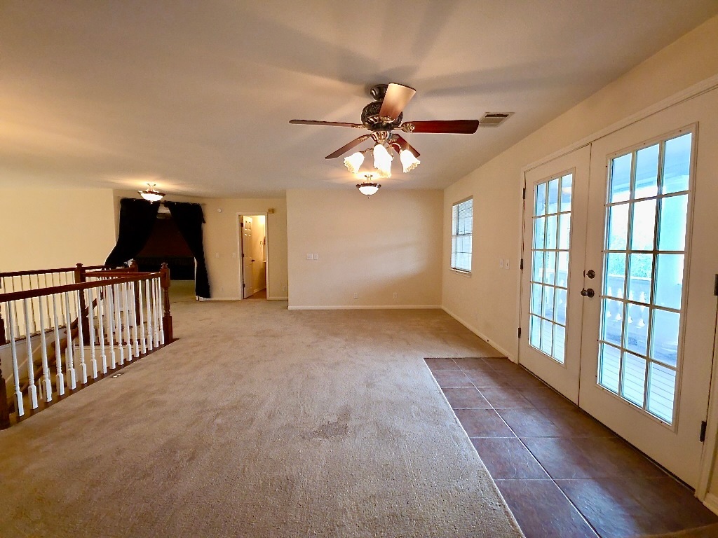1103 Seton Hall Lane Pflugerville, TX 78660 - Photo 18 of 32 Family room upstairs that is open to the living below with doors to balcony.