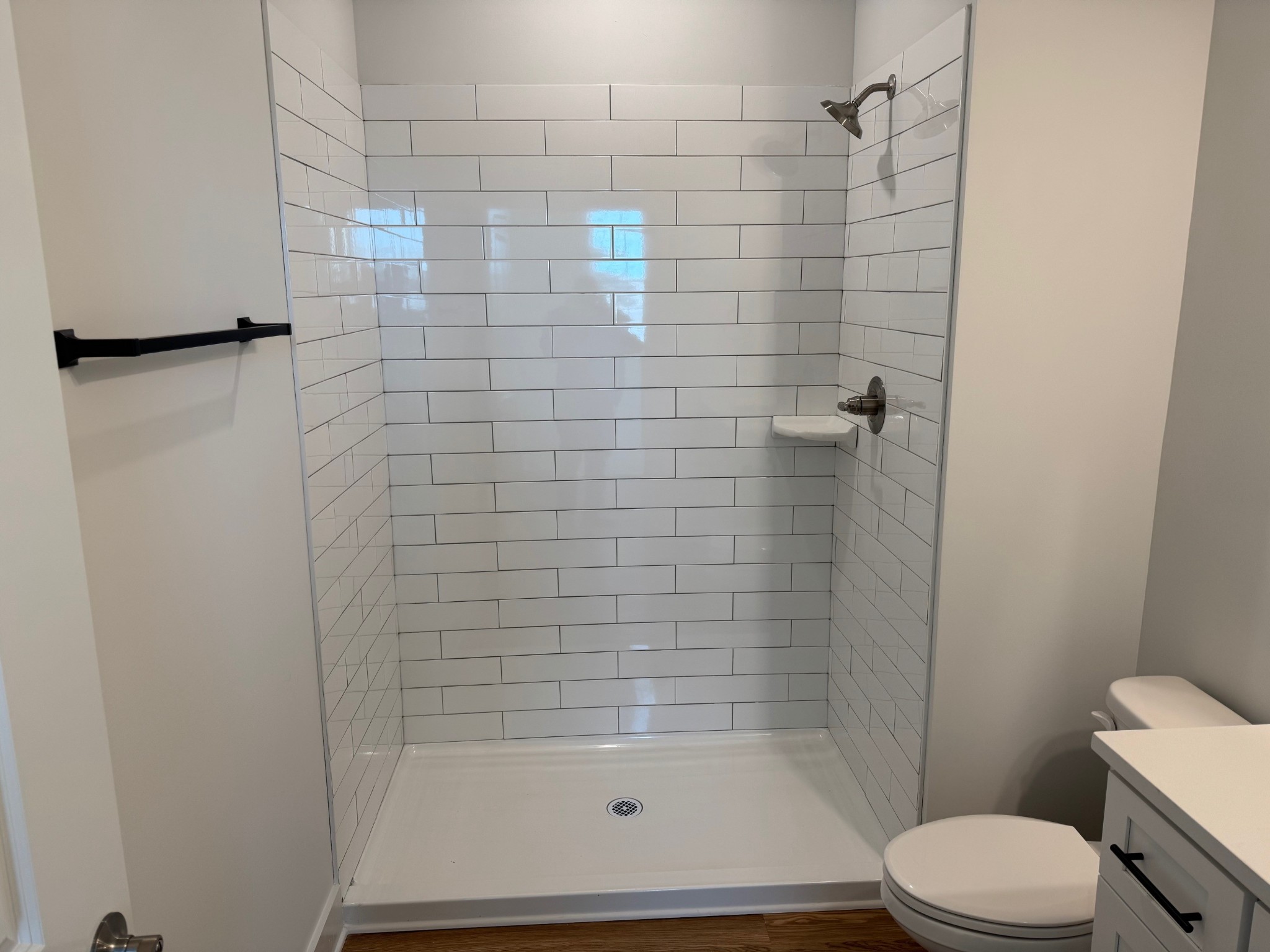 3000 Edwin Way, Unit 104 Nashville, TN 37207 - Photo 8 of 11 a bathroom with a shower and toilet