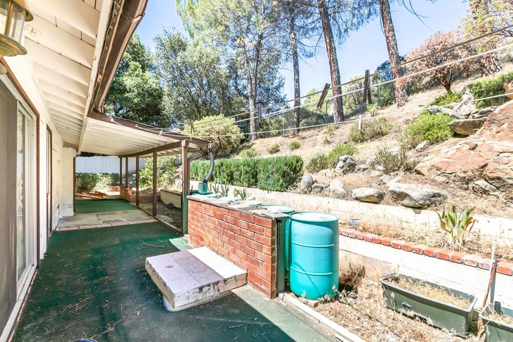 28721 Lebanon Road Pine Valley, CA 91962 - Photo 17 of 48 a view of a patio with table and chairs and potted plants