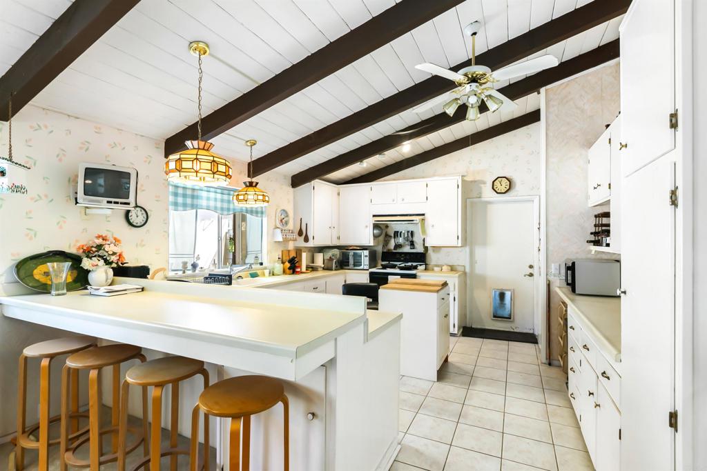 28721 Lebanon Road Pine Valley, CA 91962 - Photo 23 of 48 a kitchen with a sink appliances cabinets and furniture