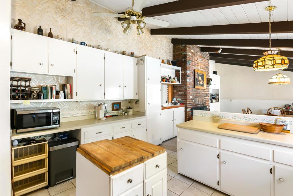 28721 Lebanon Road Pine Valley, CA 91962 - Photo 25 of 48 a kitchen that has a lot of cabinets in it and appliances