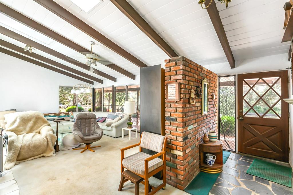 28721 Lebanon Road Pine Valley, CA 91962 - Photo 26 of 48 a living room with furniture and a chandelier