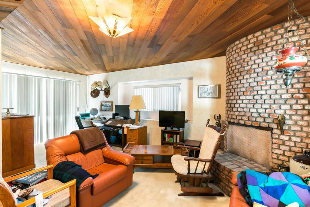 28721 Lebanon Road Pine Valley, CA 91962 - Photo 36 of 48 a living room with furniture and a flat screen tv