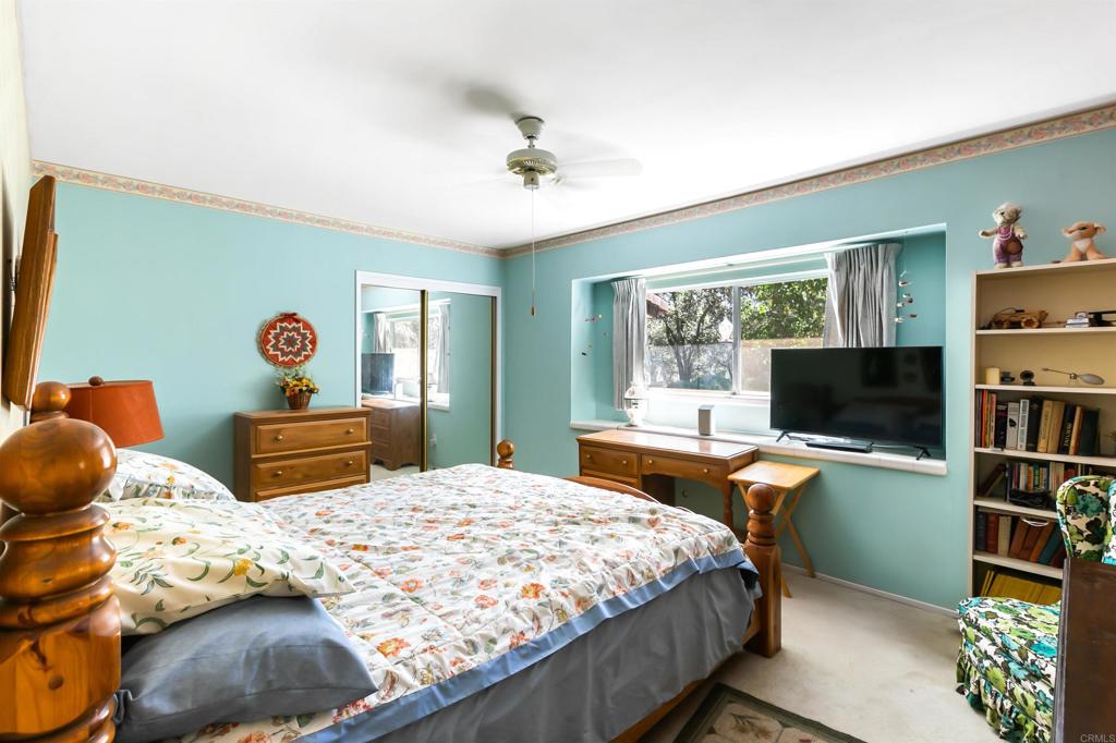 28721 Lebanon Road Pine Valley, CA 91962 - Photo 39 of 48 a bedroom with a bed and a flat screen tv