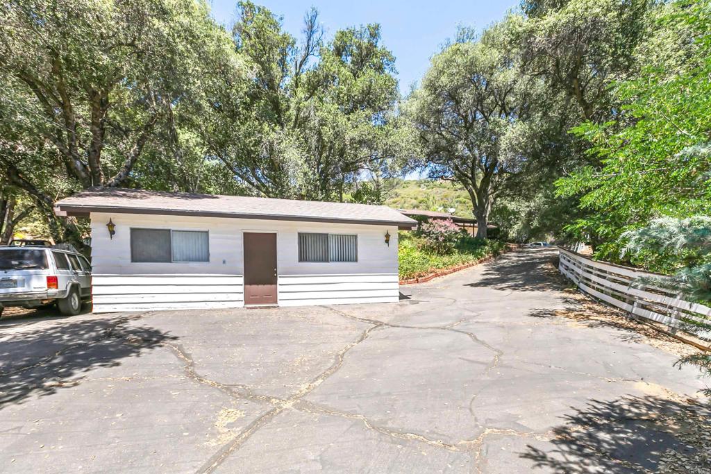 28721 Lebanon Road Pine Valley, CA 91962 - Photo 45 of 48 a front view of a house with a yard and garage