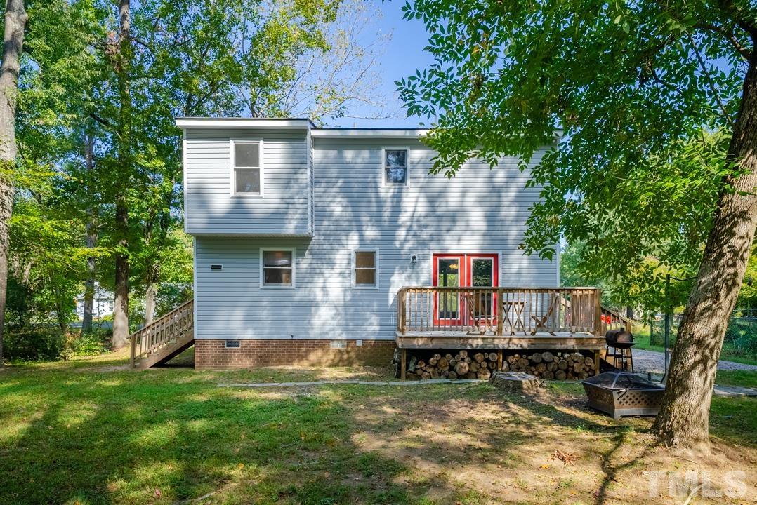 507 Valley Drive Durham, NC 27704 - Photo 24 of 29 a view of house with yard entertaining space and sitting area