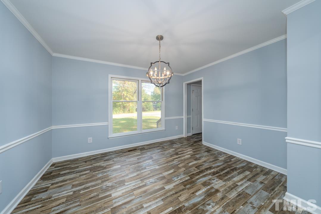 507 Valley Drive Durham, NC 27704 - Photo 6 of 29 a view of empty room with window
