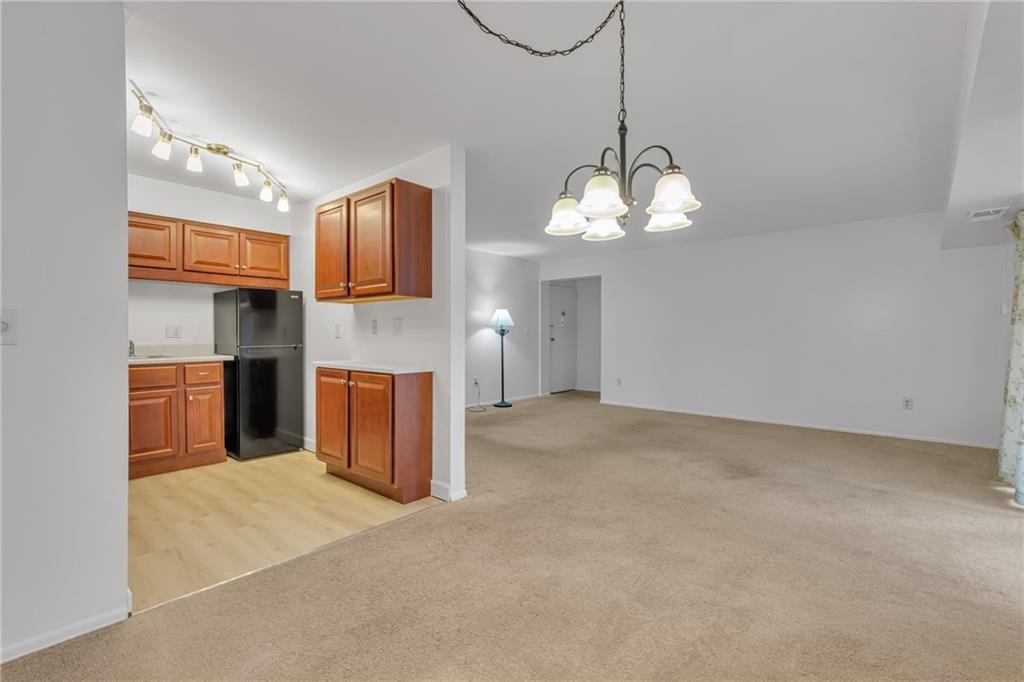 61 Darlington Road, Unit A18 Beaver Falls, PA 15010 - Photo 9 of 16 Dining Room Looking Towards Kitchen and Living Room