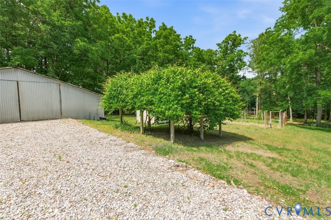 18501 Branders Bridge Road Colonial Heights, VA 23834 - Photo 30 of 43 a backyard of a house with lots of green space