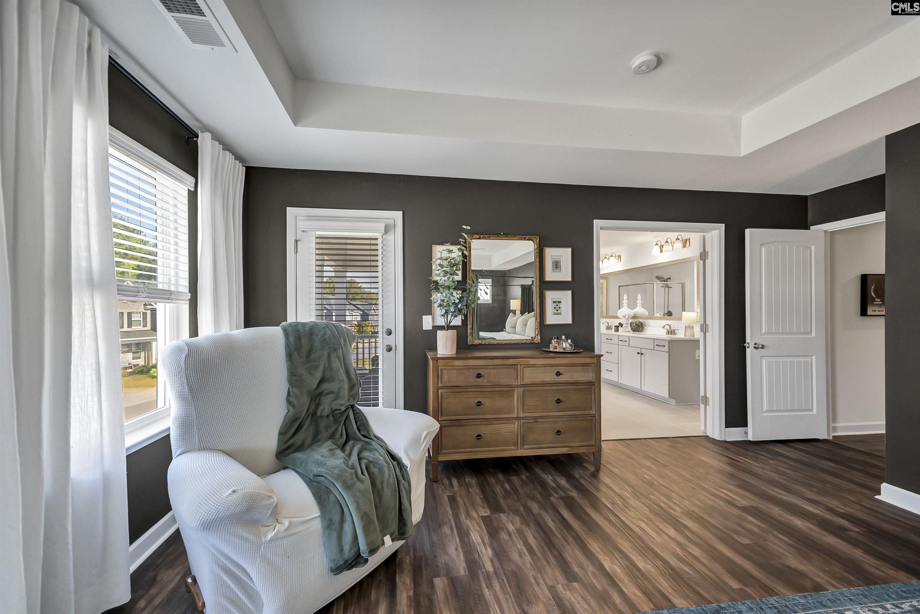 515 Malachite Lane Chapin, SC 29036 - Photo 26 of 63 a room with furniture and wooden floor