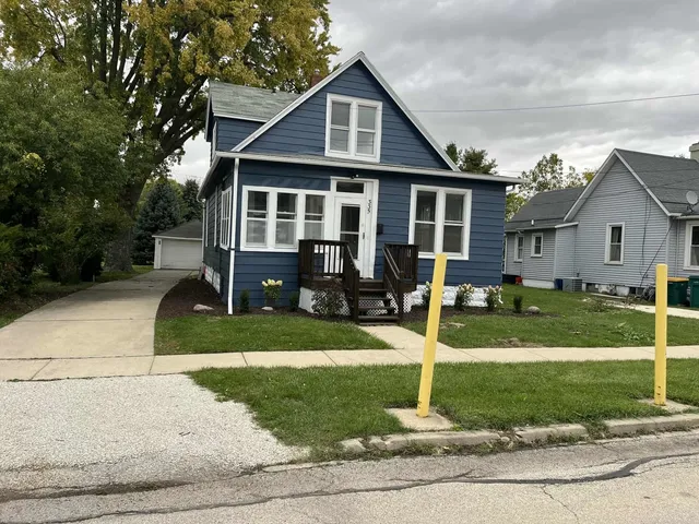 a sink with a granite countertop window