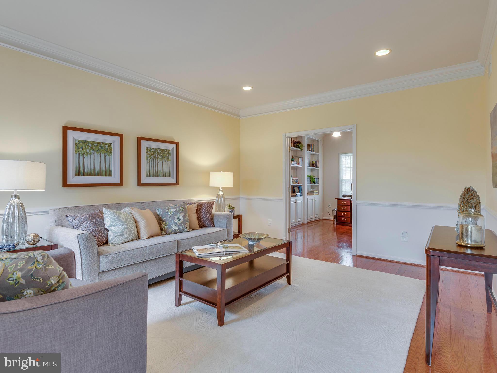 10889 Hunter Gate Way Reston, VA 20194 - Photo 14 of 30 a living room with furniture and a painting