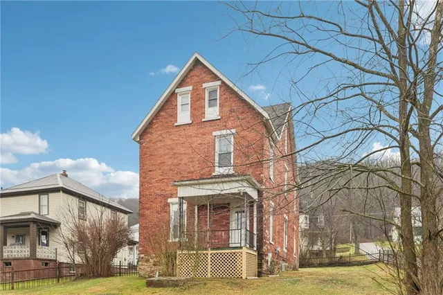 a picture of a cabinet with a white wall
