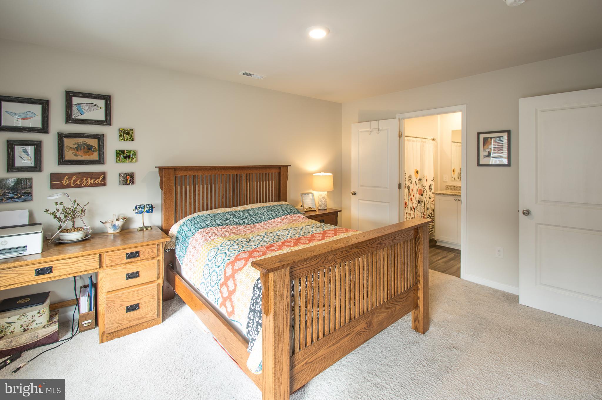 345 Maple Run Drive York, PA 17404 - Photo 16 of 26 a bedroom with a bed and a night stand