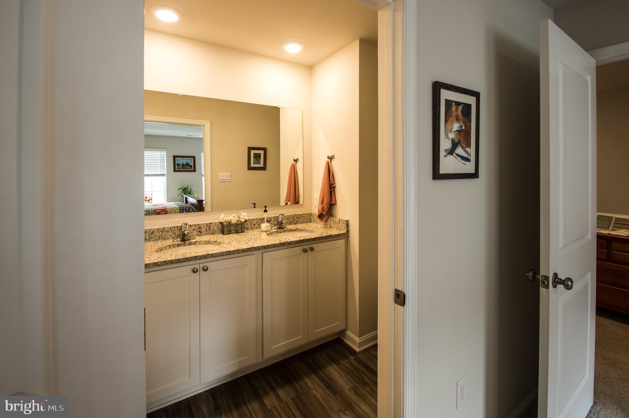 345 Maple Run Drive York, PA 17404 - Photo 18 of 26 a bathroom with a sink and a mirror