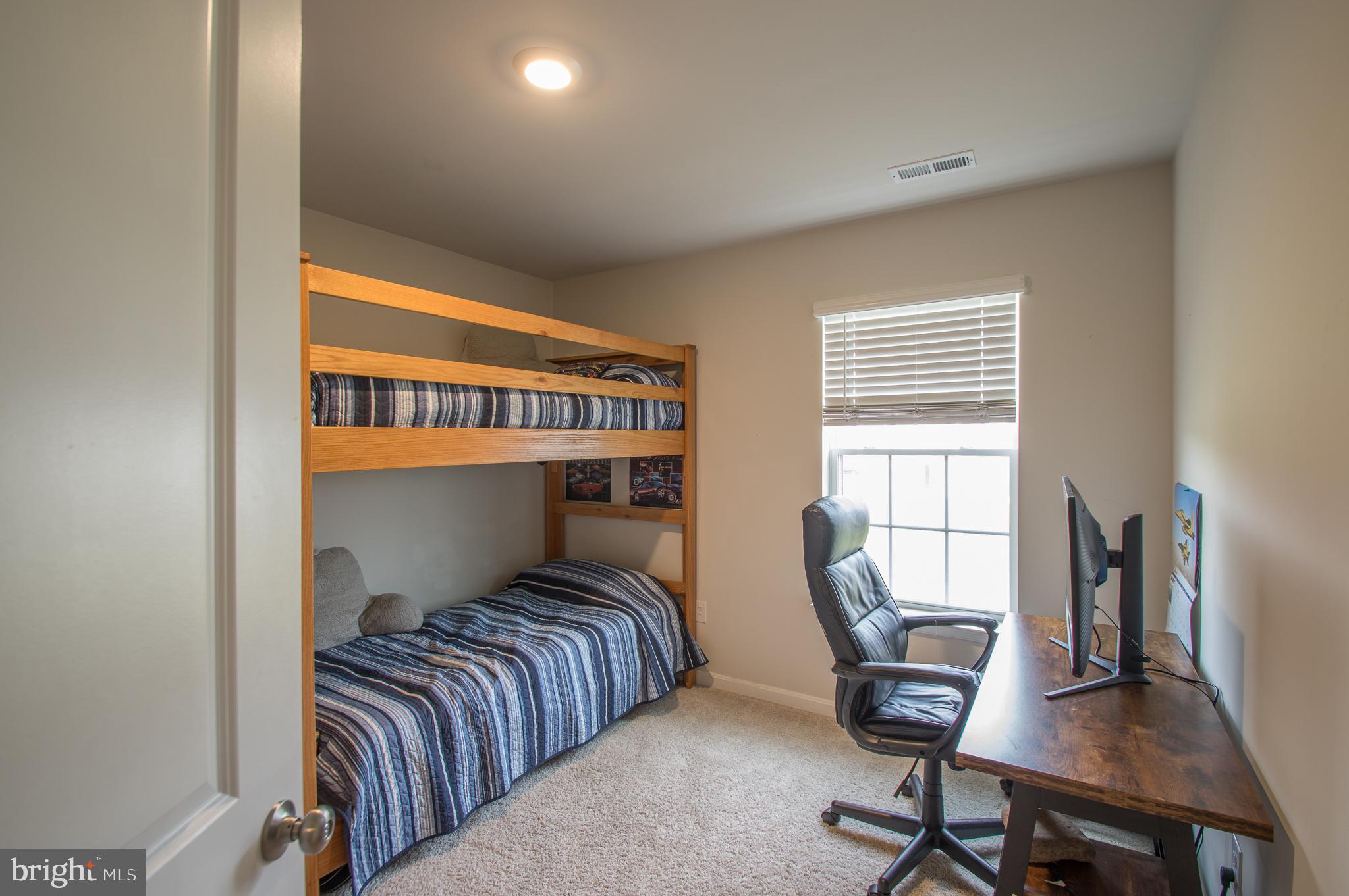 345 Maple Run Drive York, PA 17404 - Photo 20 of 26 a bedroom with furniture and a window