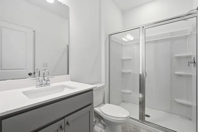 a room with a white cabinet and a window