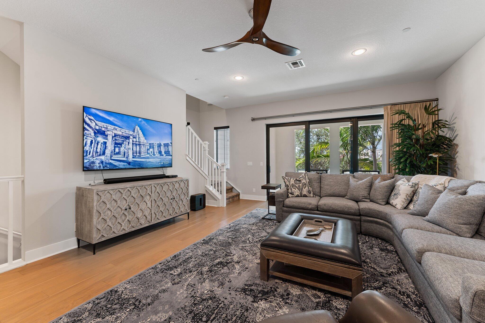 13364 Alton Road Palm Beach Gardens, FL 33418 - Photo 12 of 58 a living room with furniture and a large window