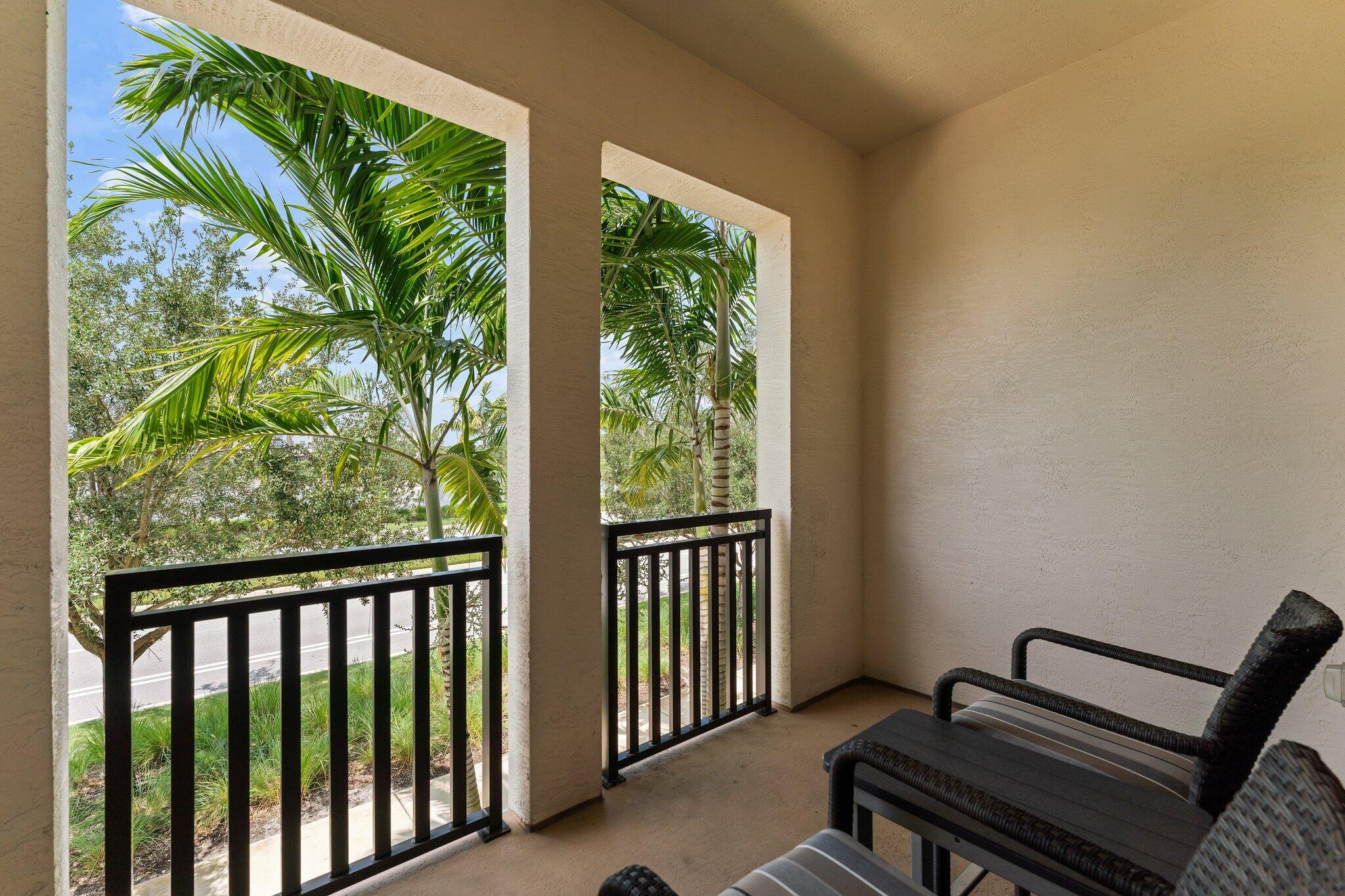 13364 Alton Road Palm Beach Gardens, FL 33418 - Photo 24 of 58 a view of a balcony with wooden floor