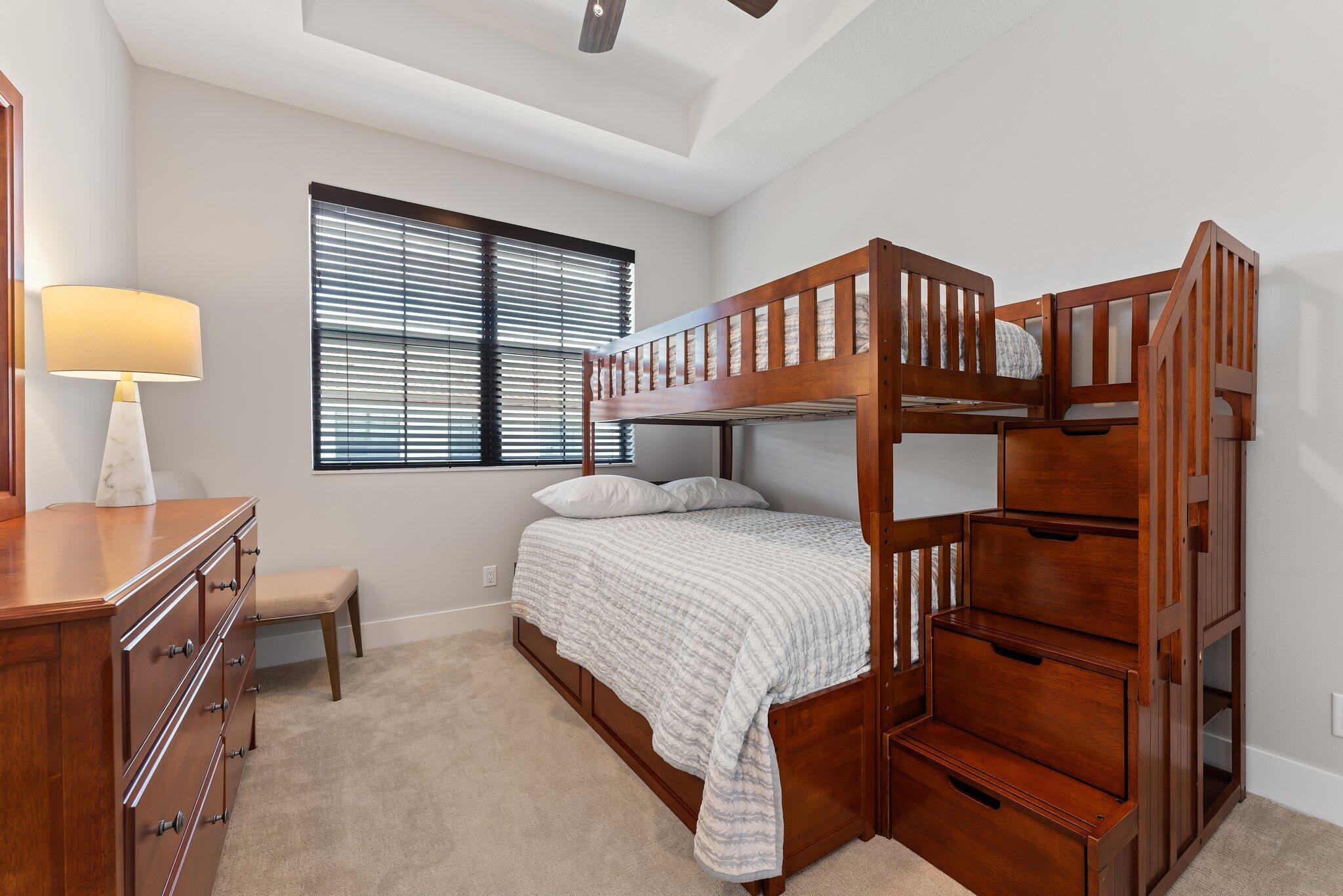 13364 Alton Road Palm Beach Gardens, FL 33418 - Photo 38 of 58 a bedroom with a bed next to a window