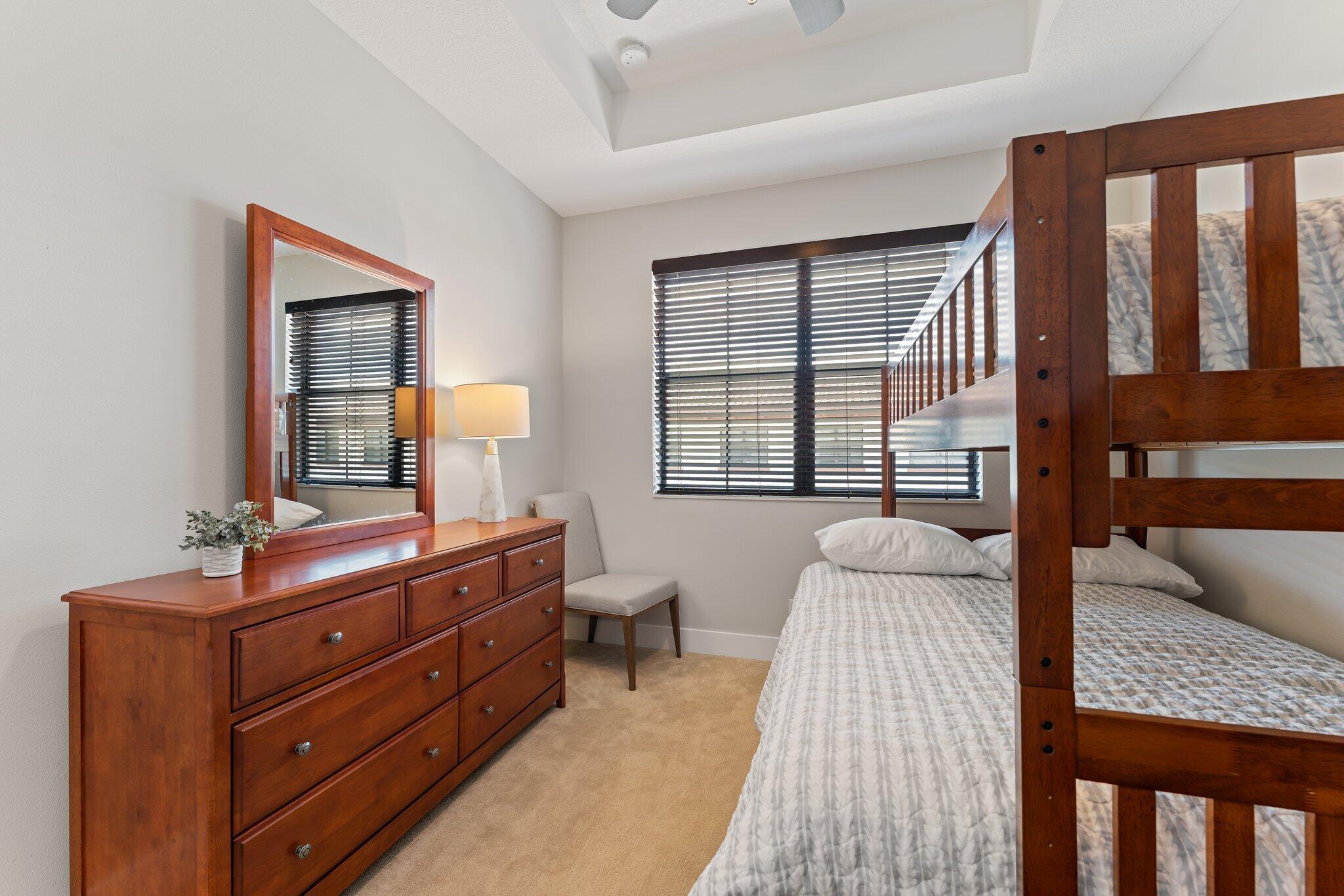 13364 Alton Road Palm Beach Gardens, FL 33418 - Photo 39 of 58 a room with a bed and a window